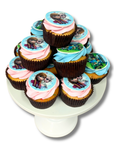Cupcakes with Frozen-themed decorations on a white cake stand