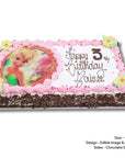 Personalised birthday cake with cartoon character and 'Happy Birthday' text on a white background