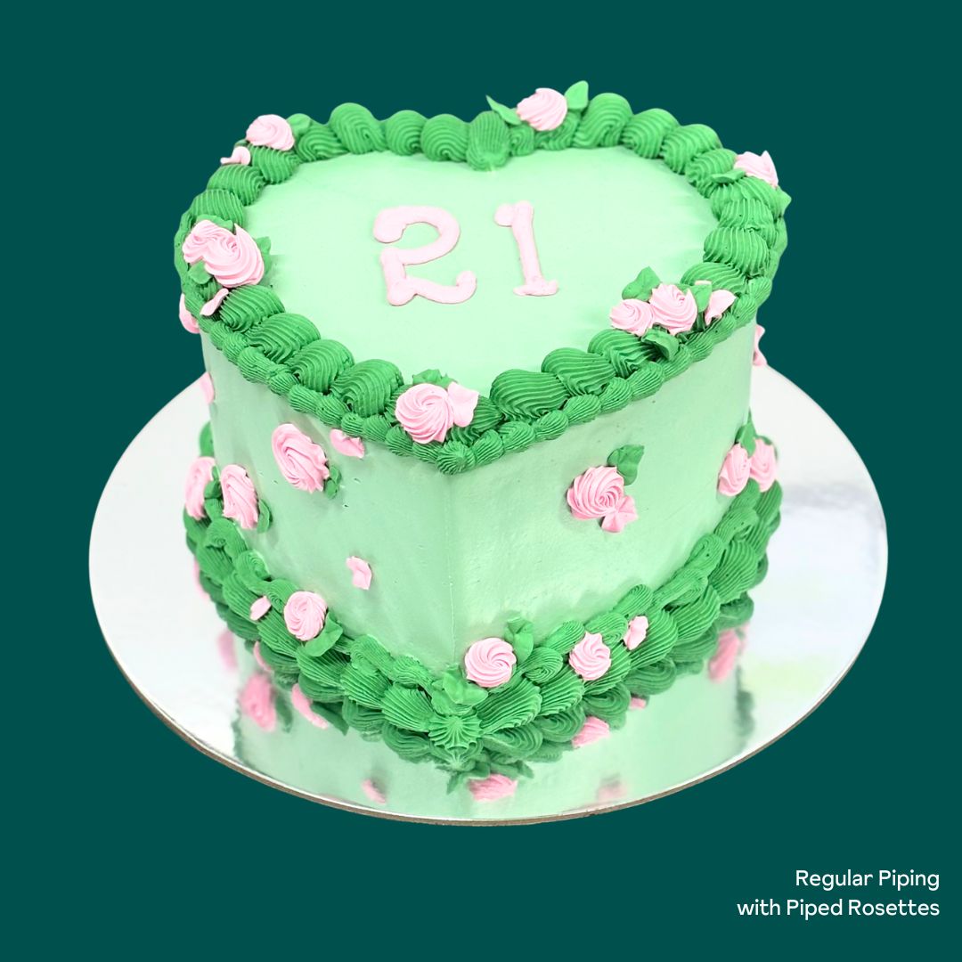 Green heart-shaped cake with pink roses Gold Coast Bakery Birthday Cakes