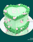 Green heart-shaped cake with pink roses Gold Coast Bakery Birthday Cakes