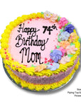 Birthday cake with colorful flowers and 'Happy 74th Birthday Mom' text on a white background