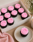 12 Pack of chocolate mud cupcakes with pink icing