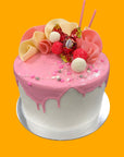 Drip Cake Six Inch Double Height White Icing with Pink Drip Gold Coast Bakery Make to Order