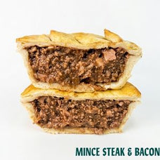 Two halves of a mince steak and bacon pie stacked vertically, showing the golden-brown flaky crust and textured brown meat filling, on a white background with 'MINCE STEAK & BACON' text at the bottom.