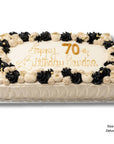 Birthday cake with beige and black deluxe piping and gold birthday message